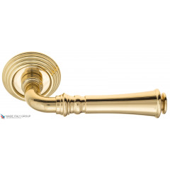 Дверная ручка на круглом основании Fratelli Cattini "GRACIA" D8-OLV полированная латунь