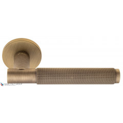 Дверная ручка на круглом основании Fratelli Cattini "UNA X" 7FS-BY матовая бронза