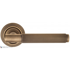 Дверная ручка на круглом основании Fratelli Cattini "UNA X" D8-BY матовая бронза