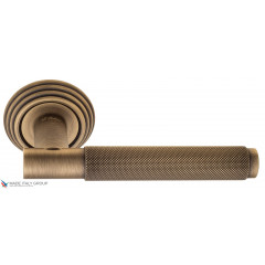 Дверная ручка на круглом основании Fratelli Cattini "UNA X" D8-BY матовая бронза