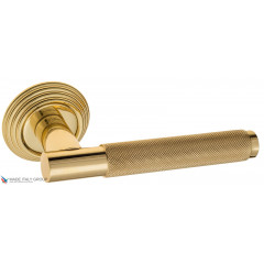 Дверная ручка на круглом основании Fratelli Cattini "UNA X" D8-OLV полированная латунь